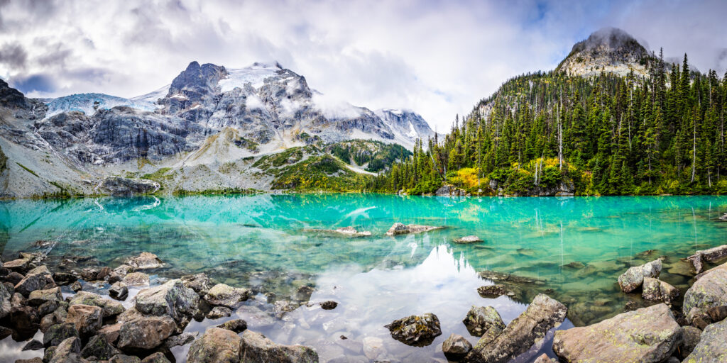 Beautiful blue water with the mountains in the background. 