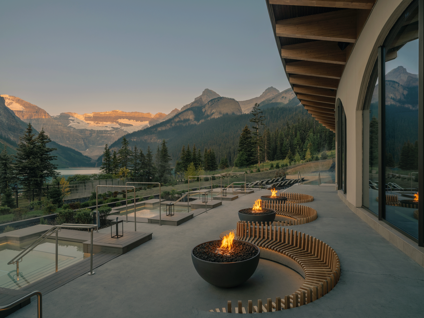 View from the pool deck at BASIN Glacial Waters in Lake Louise
