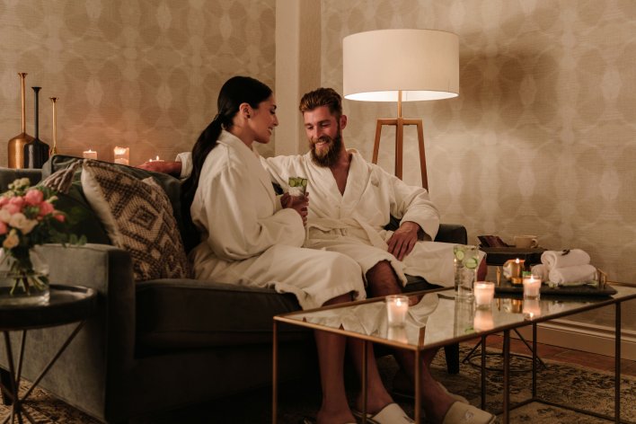 A couple enjoying a spa date at Chateau Lake Louise.
