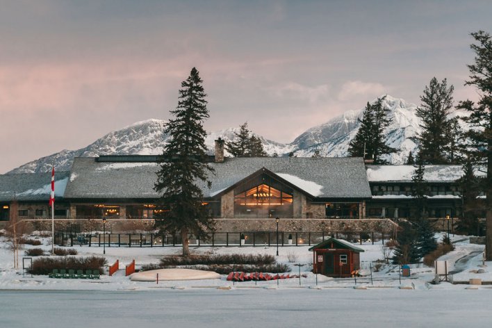 Fairmont Jasper Park Lodge, main lodge at dusk in the winter. Located in Jasper National Park, Canada