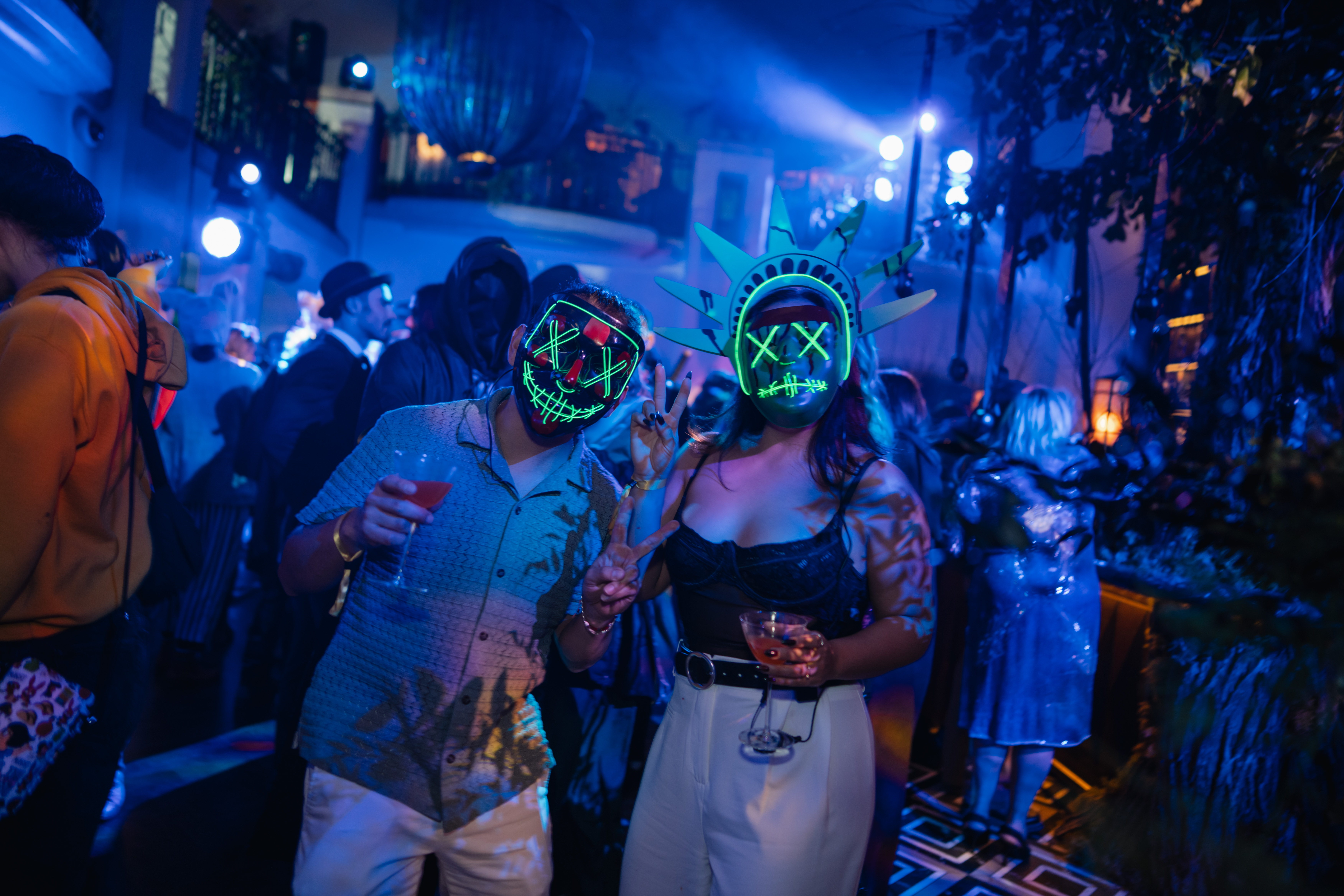 two Halloween partiers pose for a photo at Rundle Bar's annual Halloween Bash.