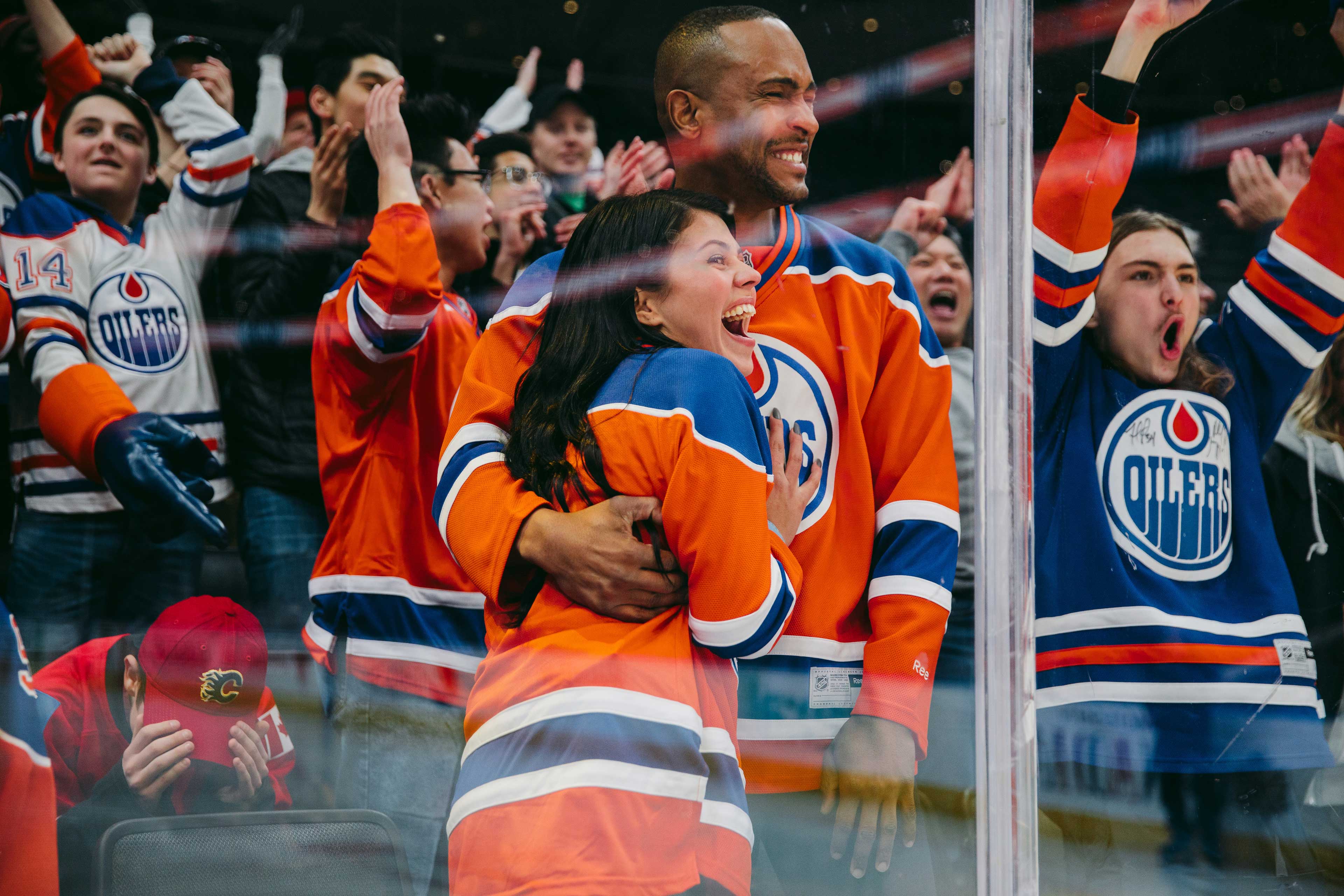 Edmonton Oiler fans enjoying one of the most Canadian things to do in Winter. Watching hockey. 