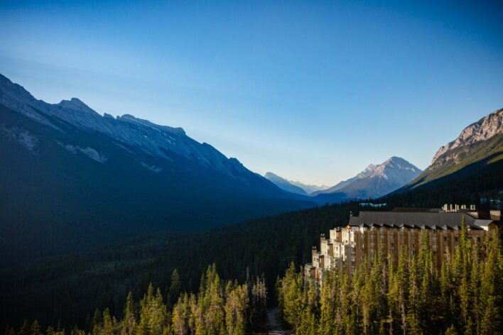 Aerial view of Rimrock Banff, Emblems Collection sitting above the Spray Valley in Banff National Park.