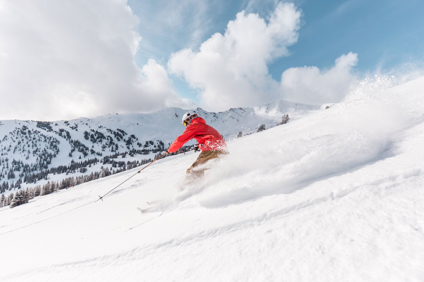 A Skier skiing down the hill at Whistler Blackcomb, one of Canada's Top destinations