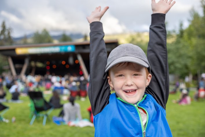 Happy Young Boy Having Fun During Whistler Summer festival at Olympic Plaza