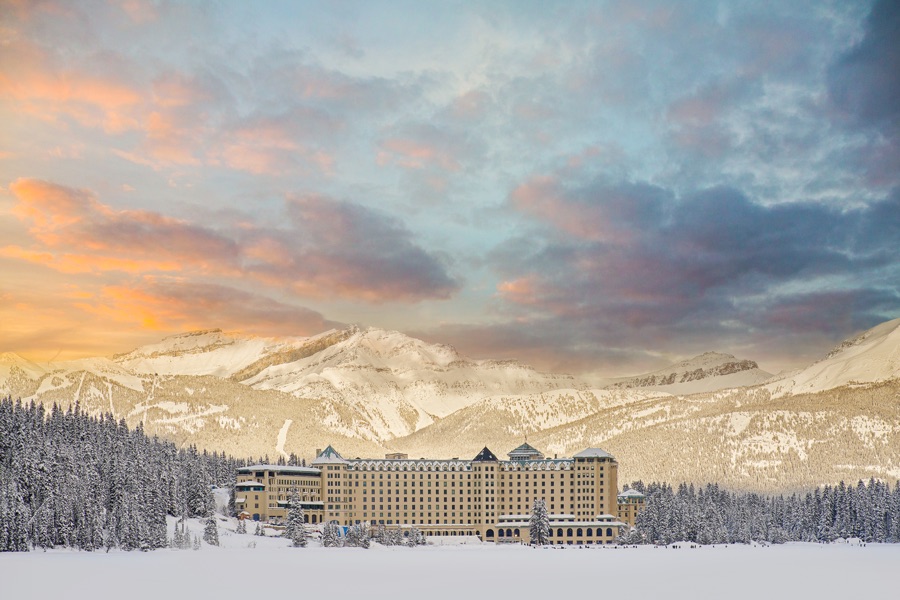 View of the Lake Louise hotel with the mountains in the background